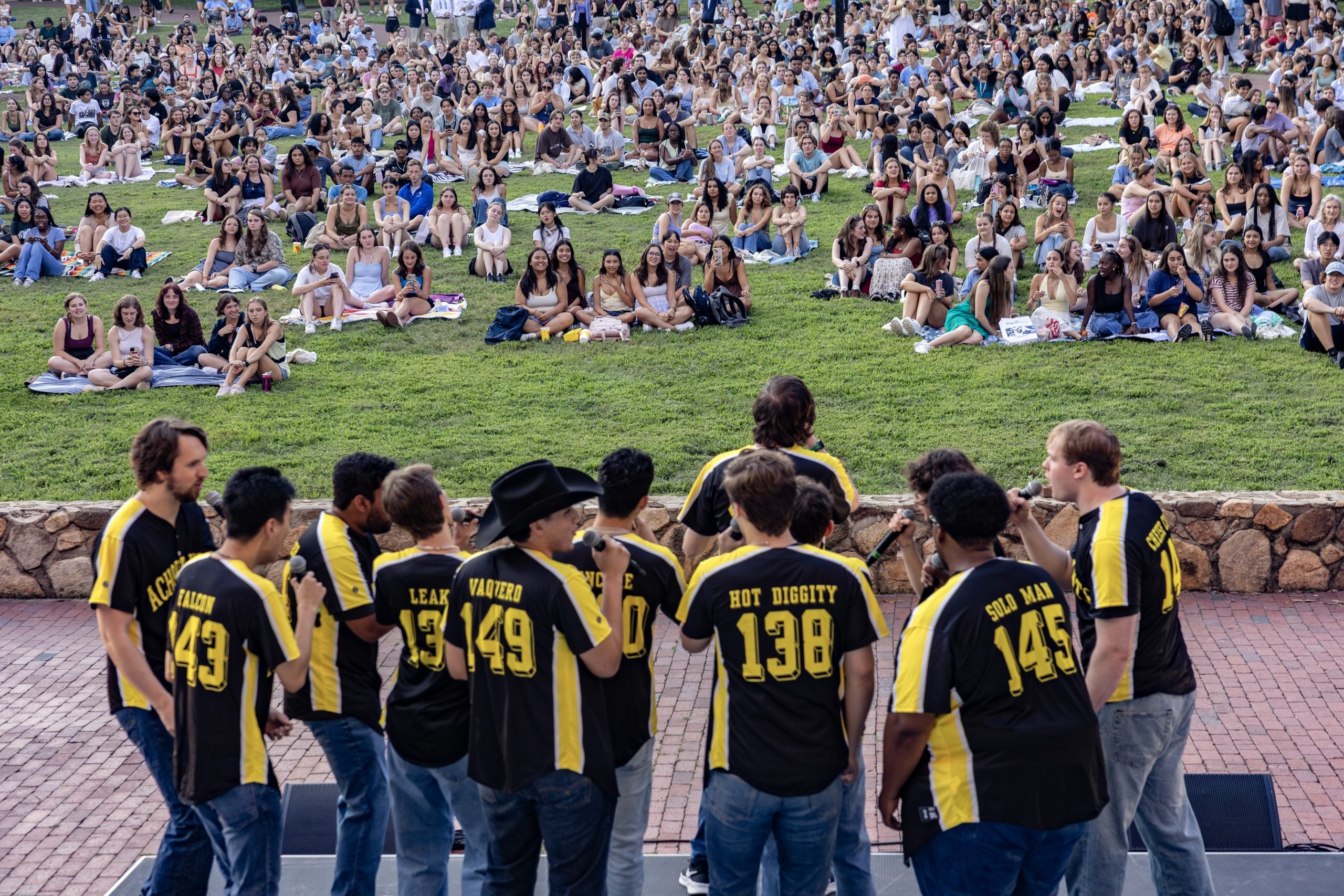 A cappella groups perform during Sunset Serenade held on Polk Place.