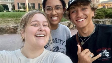 Amy Hyde taking a selfie outside the Carolina Inn with a friend and Gavin Casalegno, the actor who plays Jeremiah on “The Summer I Turned Pretty.”