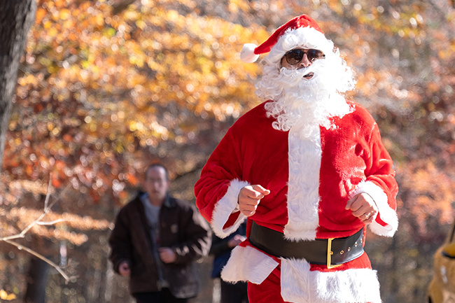 Runner dressed as Santa Clause.