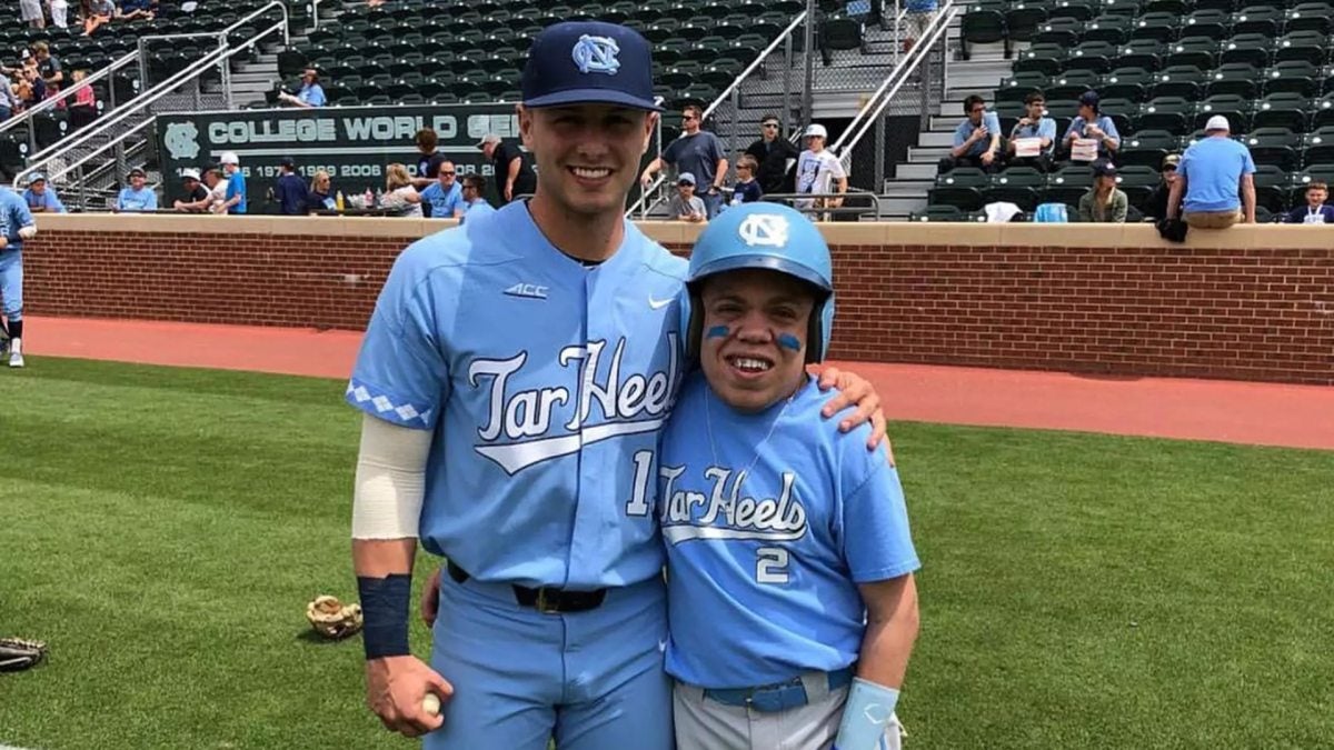 JR Anton wearing Carolina Blue baseball uniform on baseball field.