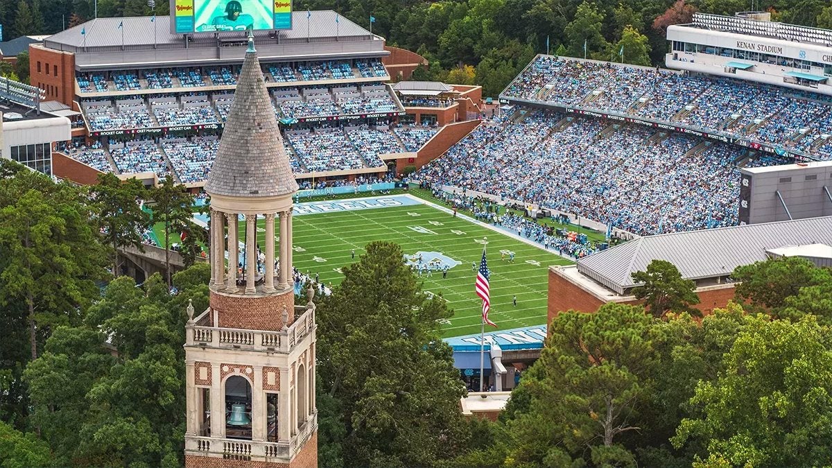 Aerial view of the Bell Tower in front of Kenan Stadium during a Carolina football game.