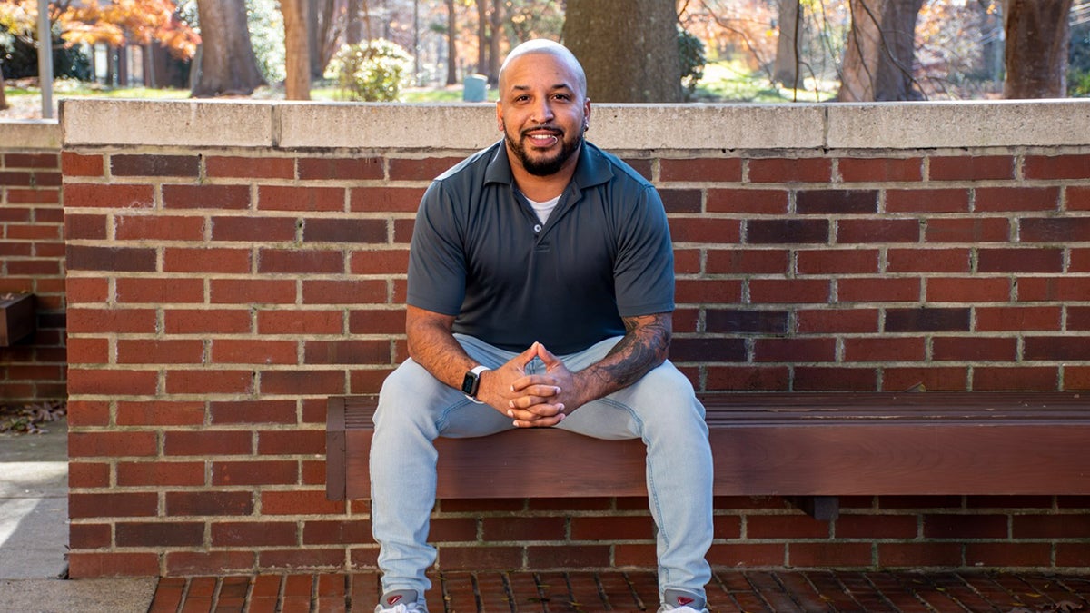 Patrick Clifford sitting on a bench