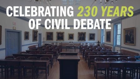 Meeting room inside New West building on the campus of UNC-Chapel Hill. Graphic text reads: 