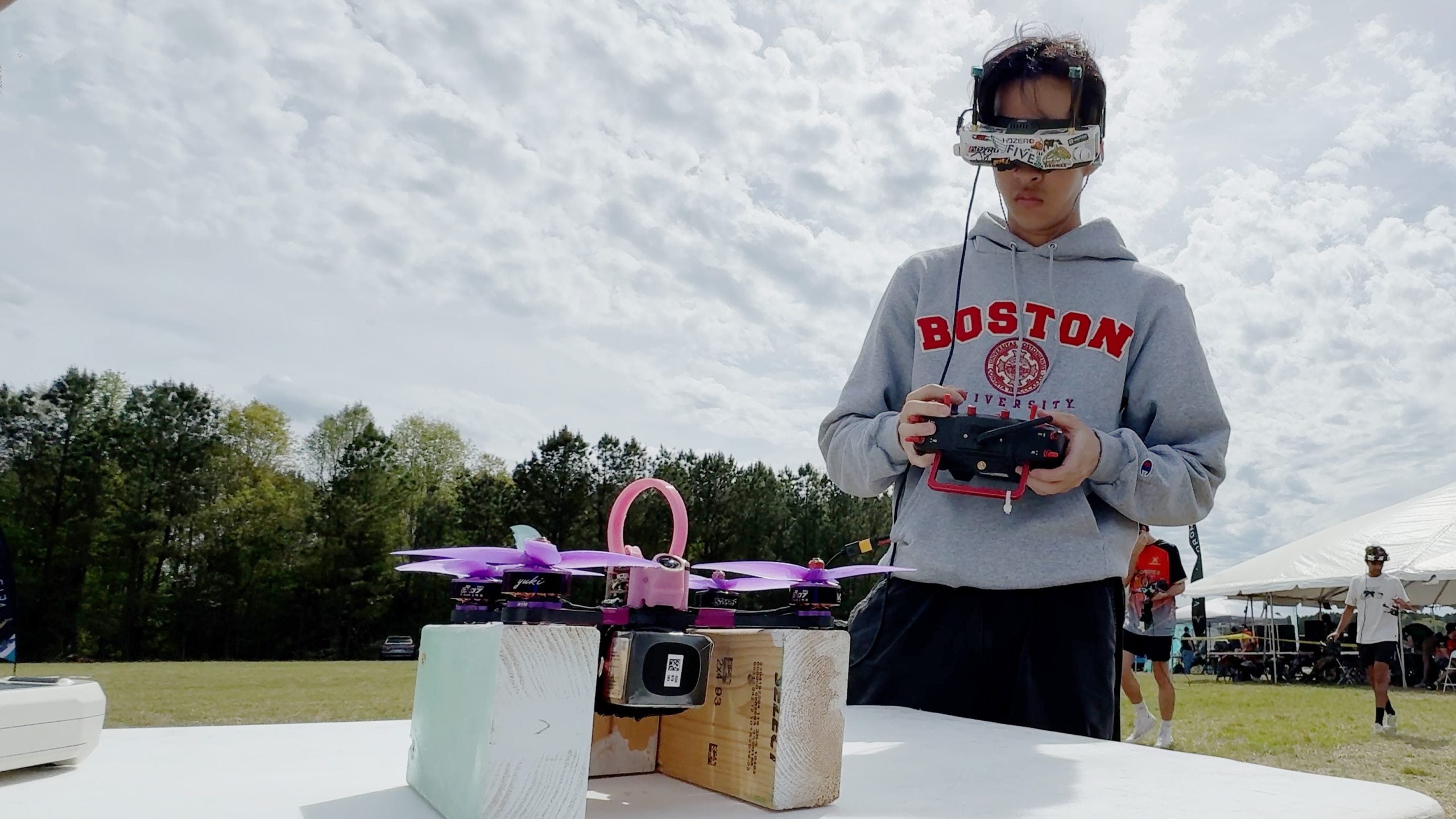 Student piloting drone.