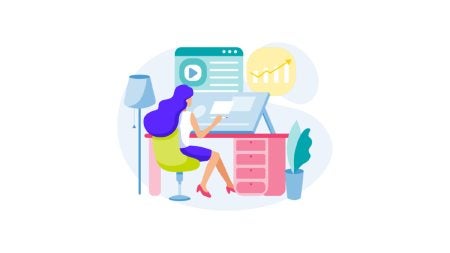 A graphic of a person working at a desk.