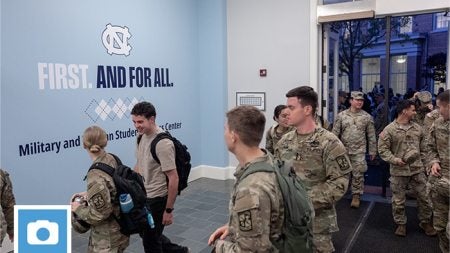 UNC-Chapel Hill ROTC members walking into the Military and Veteran Student Success Center.