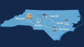 Carolina Blue state of North Carolina outline atop a Navy Blue background. The state outline has Old Well icons next to five city names: Chapel Hill, Kinston, Vine Swamp, Aberdeen and Morganton.