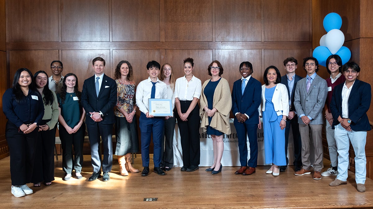 Chancellor Lee H. Roberts poses with winners of the Robert E. Bryan Public Service Awards at an event April 16. (Jon Gardiner/UNC-Chapel Hill)