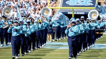 The Carolina marching band performs on the field at Kenan Stadium before the Tar Heels' game against Clemson.