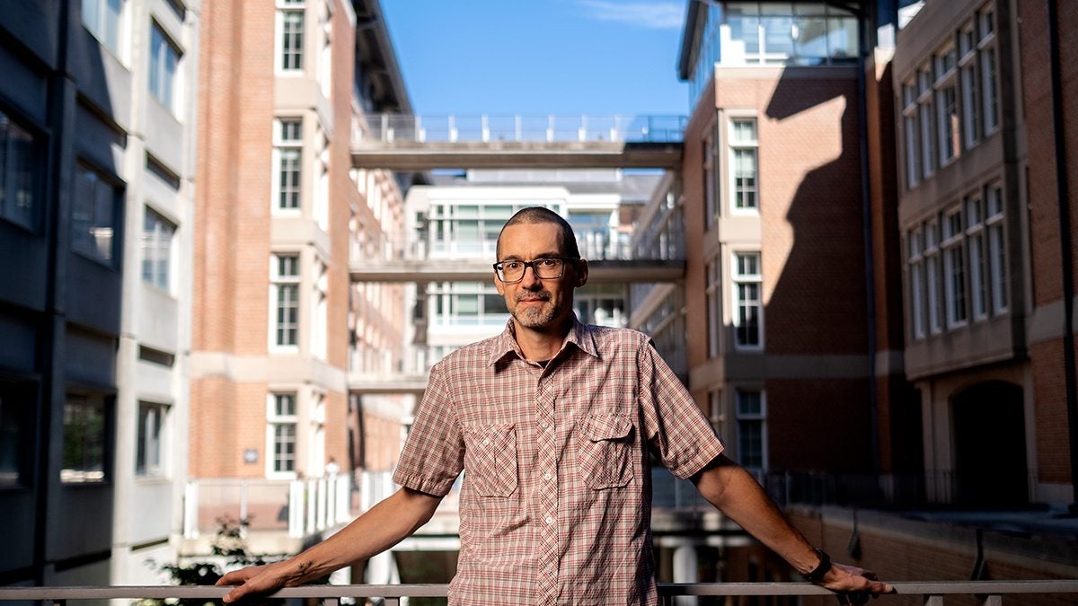 brian hogan standing outside.