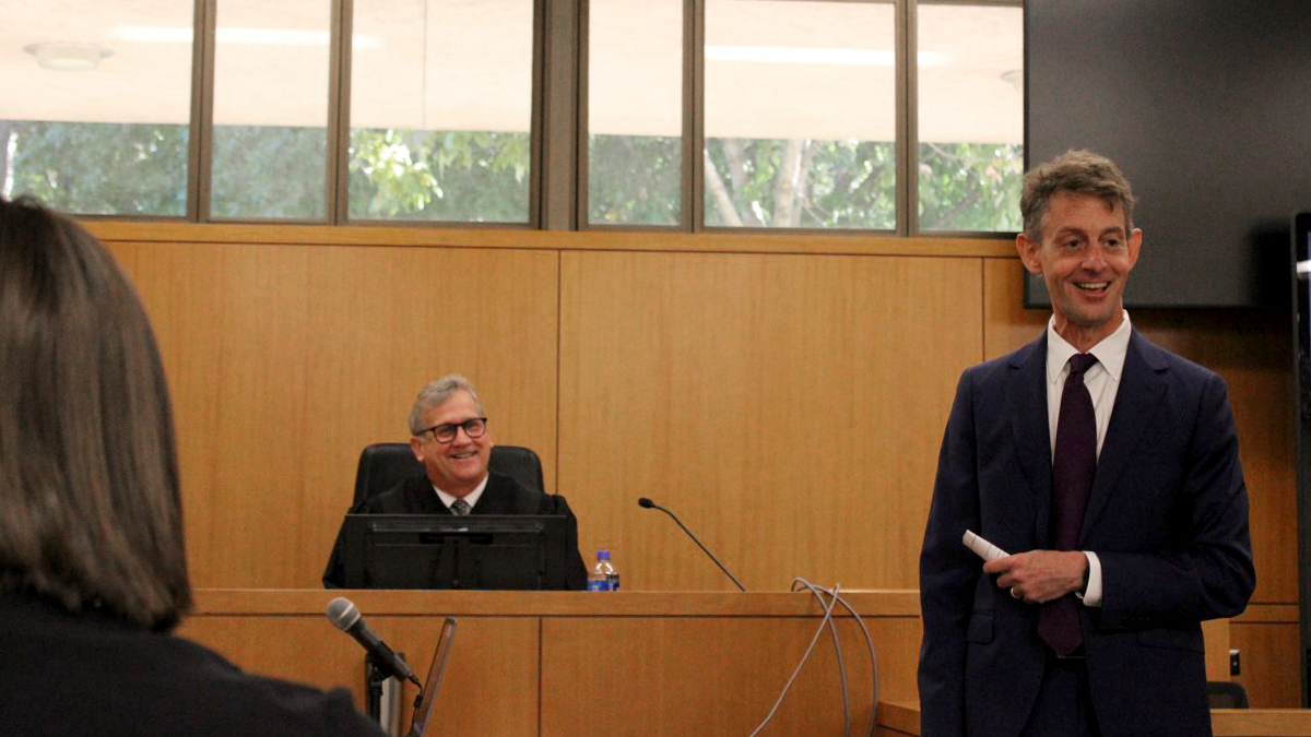 A person representing a teen in a mock trial.