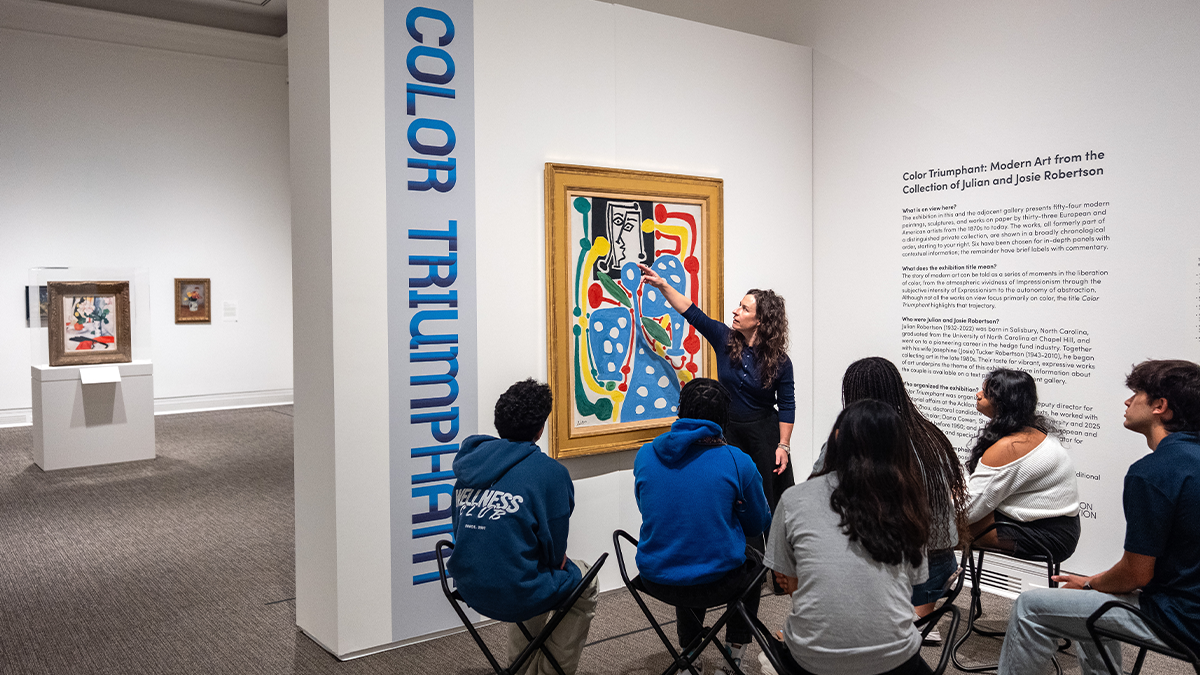 Elizabeth Manekin showing a piece to Robertson scholars.