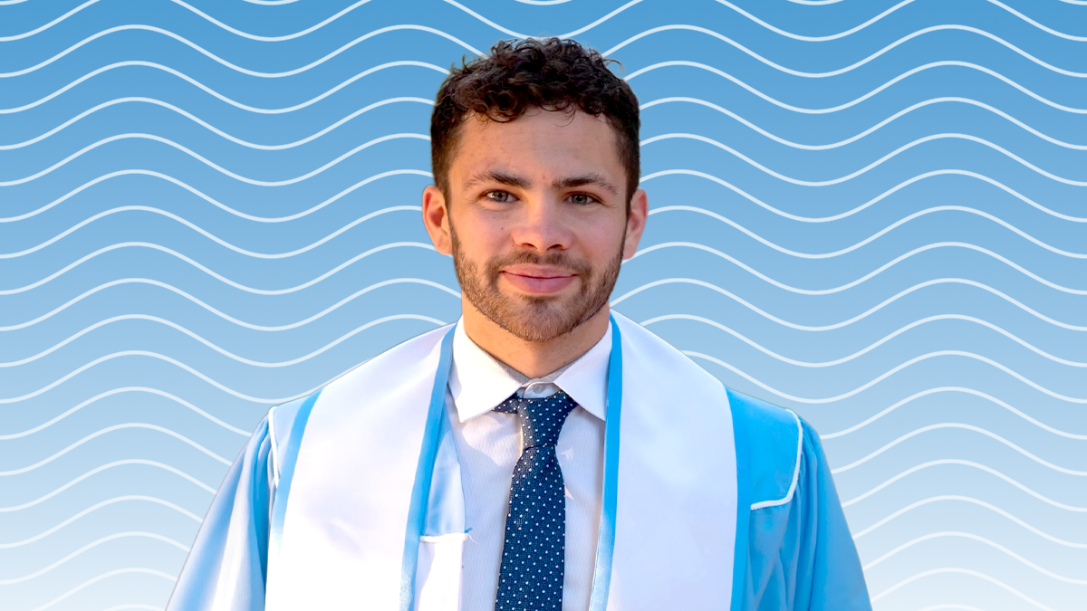 Patrick Anderson in Carolina Blue Commencement regalia.