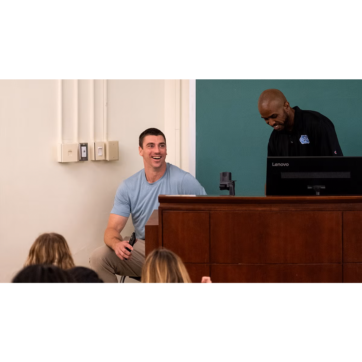 Tyler Hansborough at the front of a classroom.